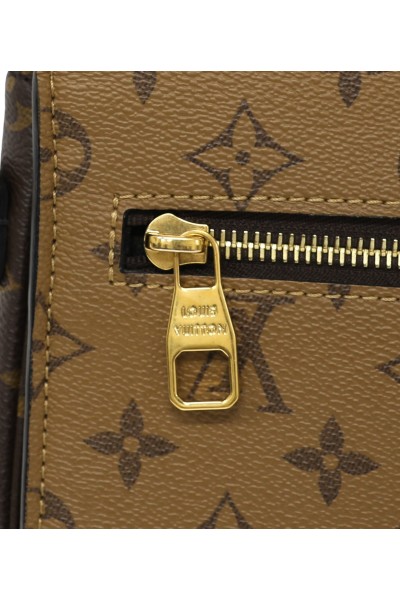 Borsa Louis Vuitton Métis Reverse